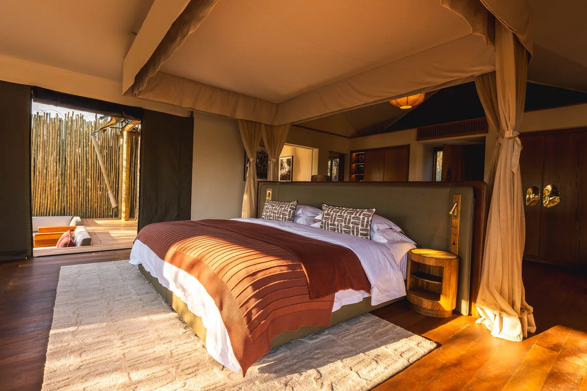 Canopy bed opening onto the deck