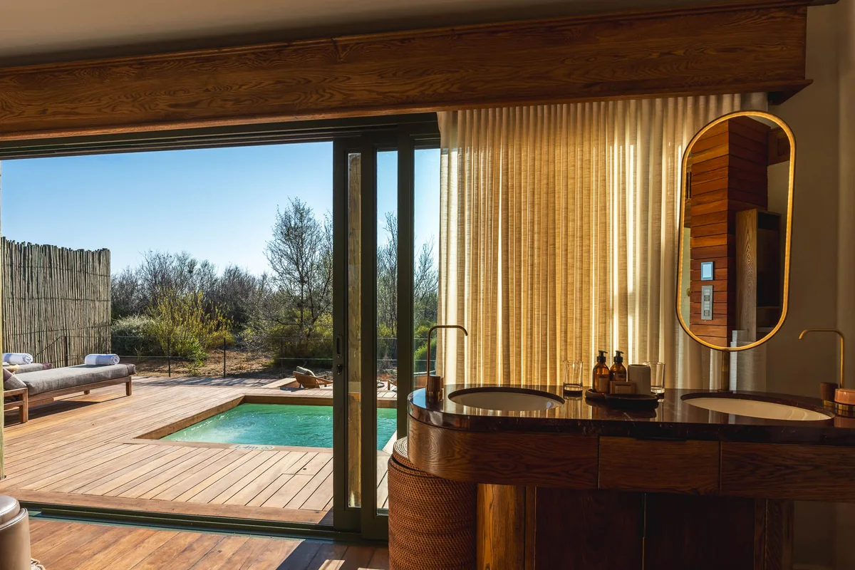 Bathroom vanity opening onto the plunge pool