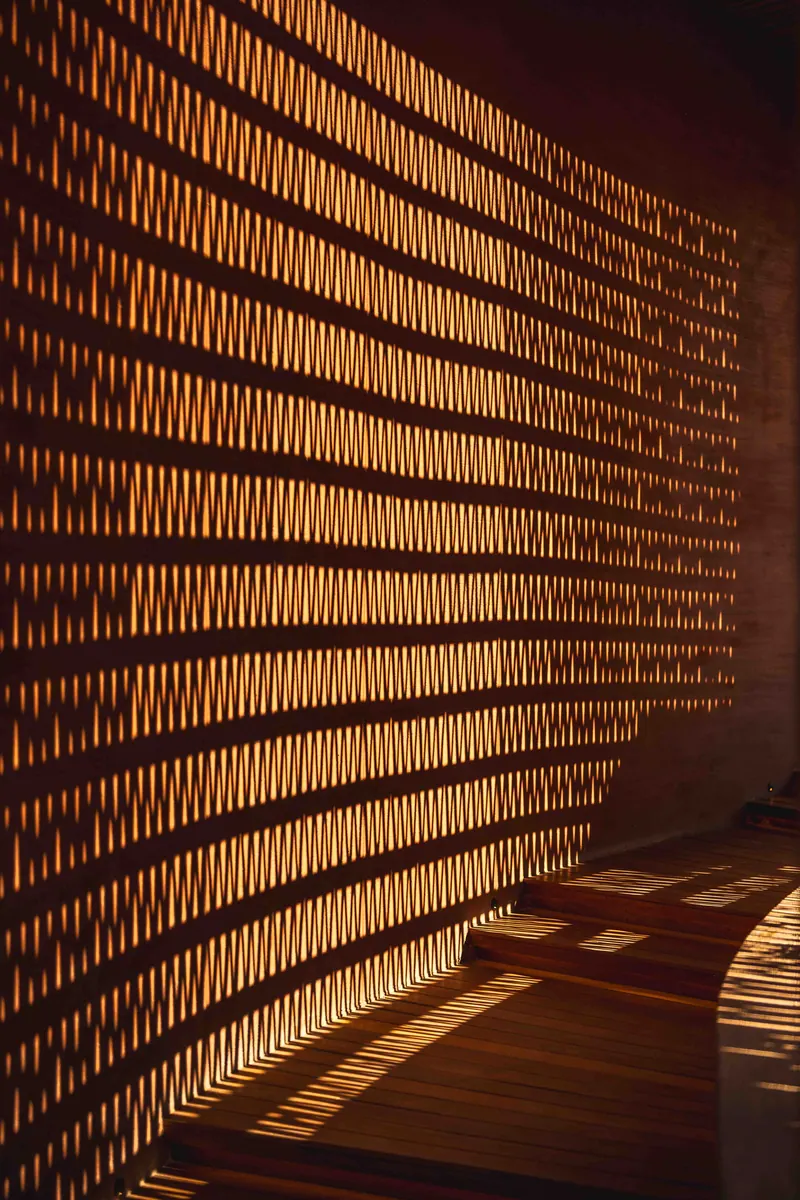 Perforated brick in raking light