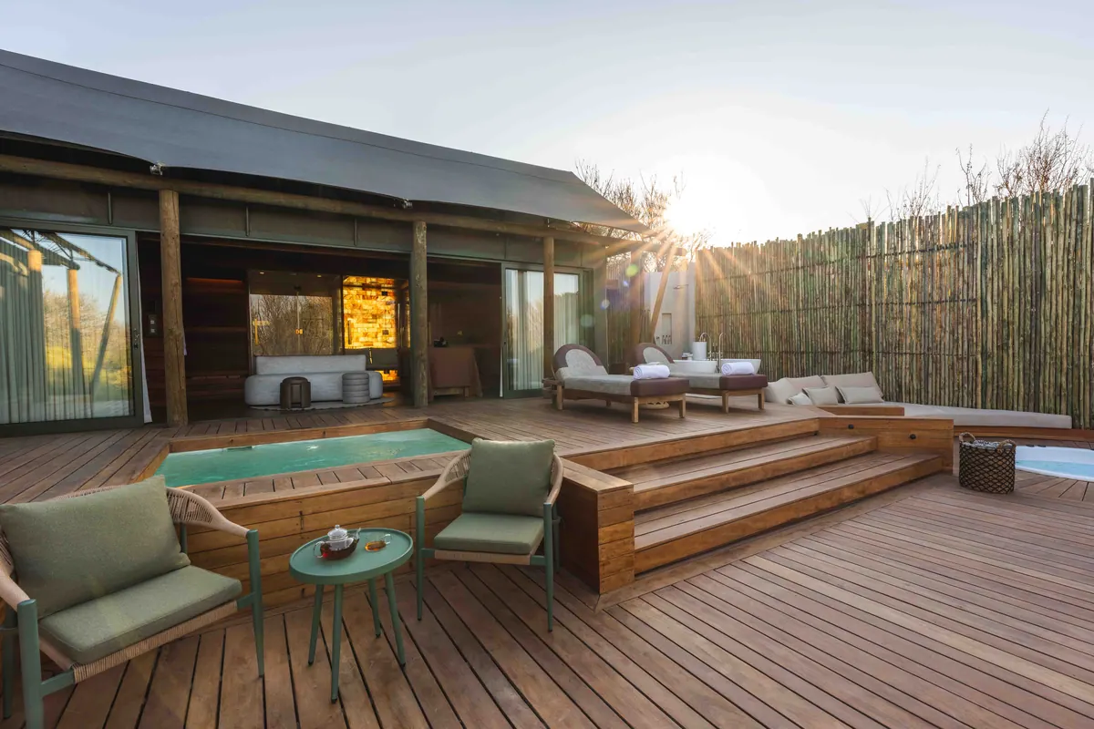 Suite terrace with loungers and plunge pool in the sun