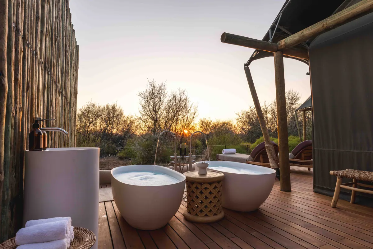 Twin outdoor baths at sunset