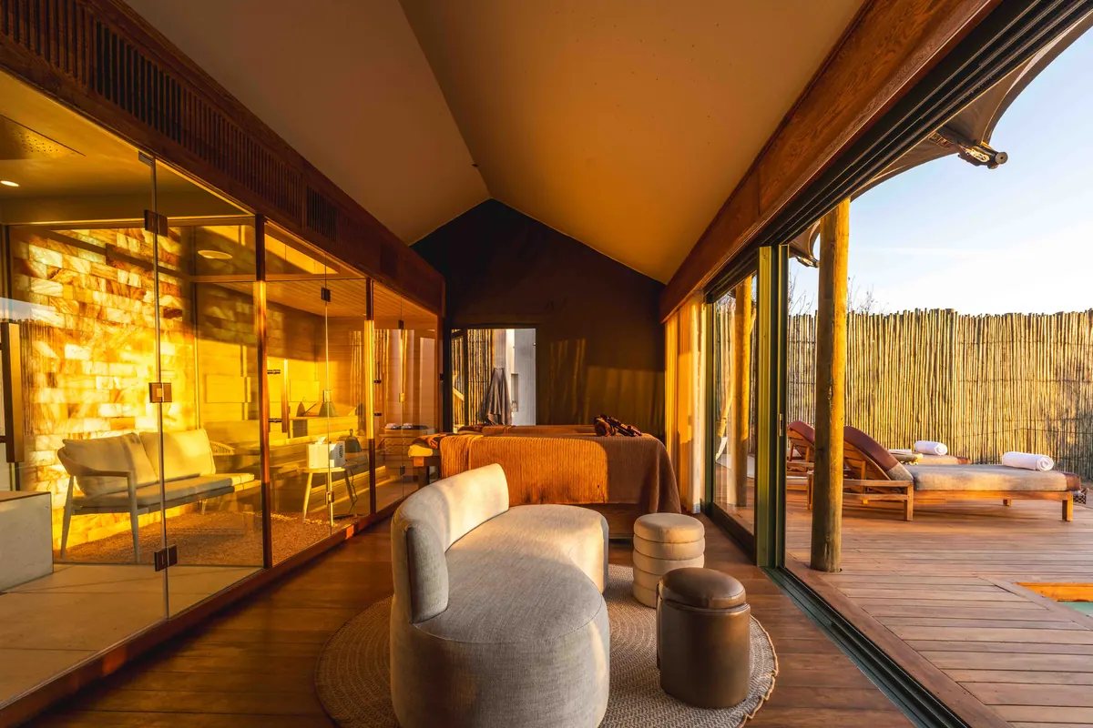 Suite interior of glass, timber and stone